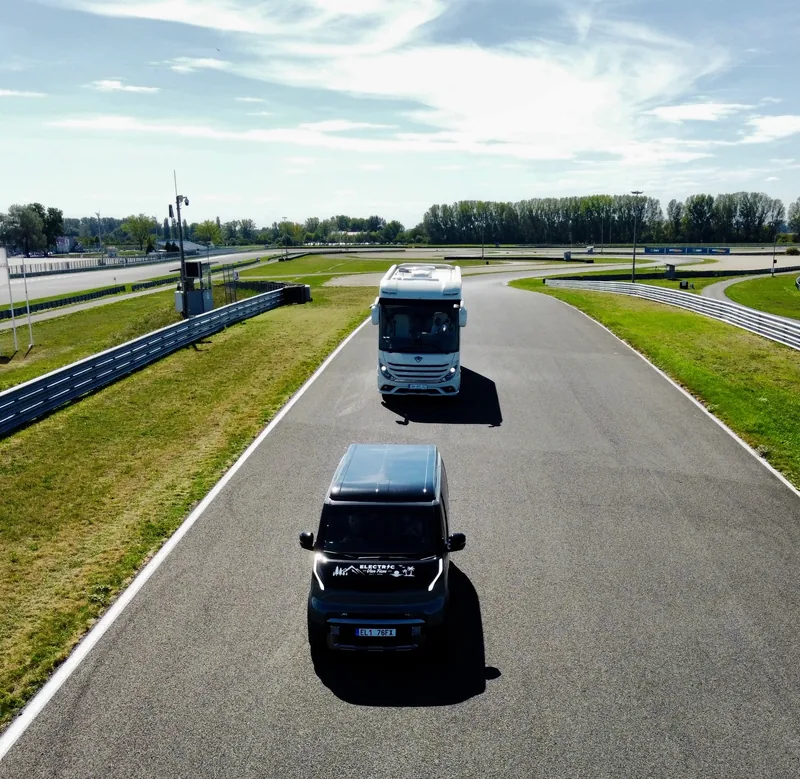 Campervans driving on the Slovakia Ring race track, seen from above